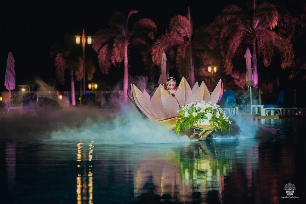 Bride arriving by boat for her Indian wedding entry
