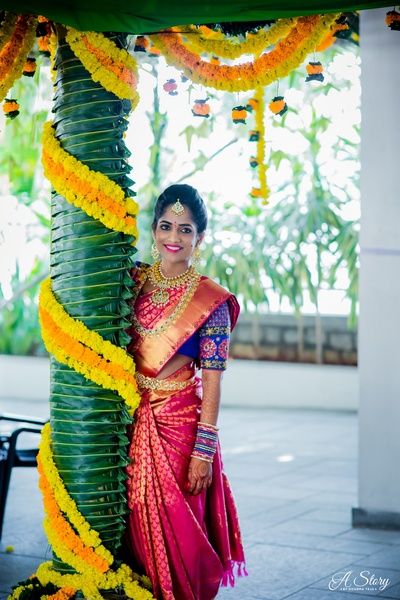 Pink bridal Kanjivaram saree with jewel tones