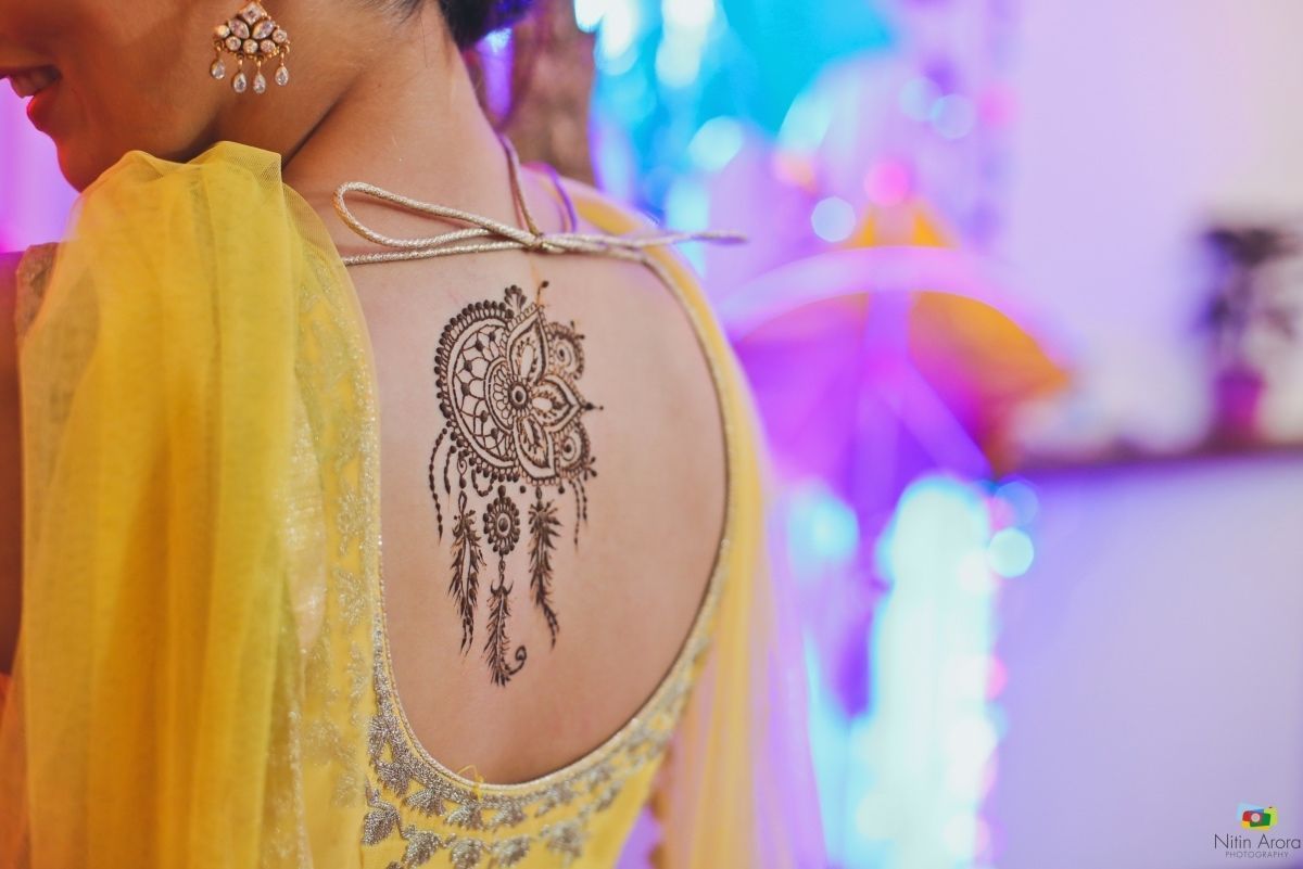 mehendi design on the back