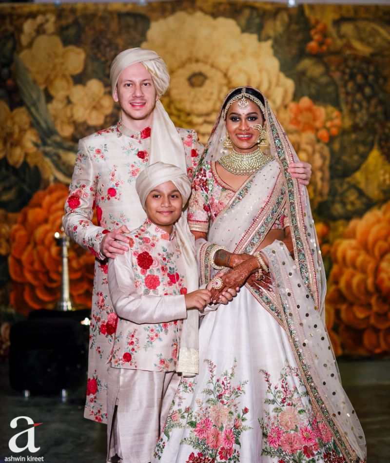 White bridal lehenga with rpinted off white blouse