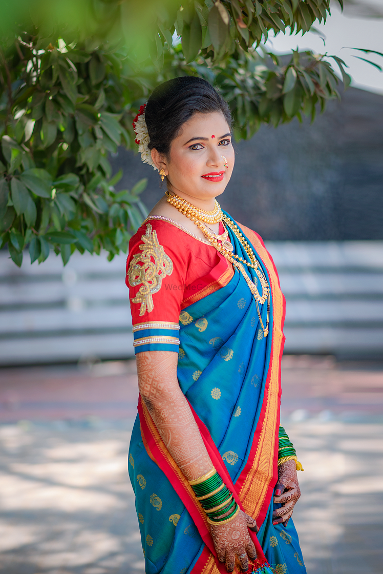 Cerulean blue and red bridal nauvari saree
