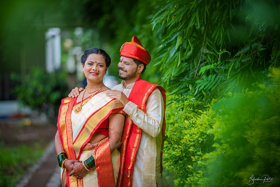 Off white Bridal Nauvari saree with red pallu and jewel toned borders
