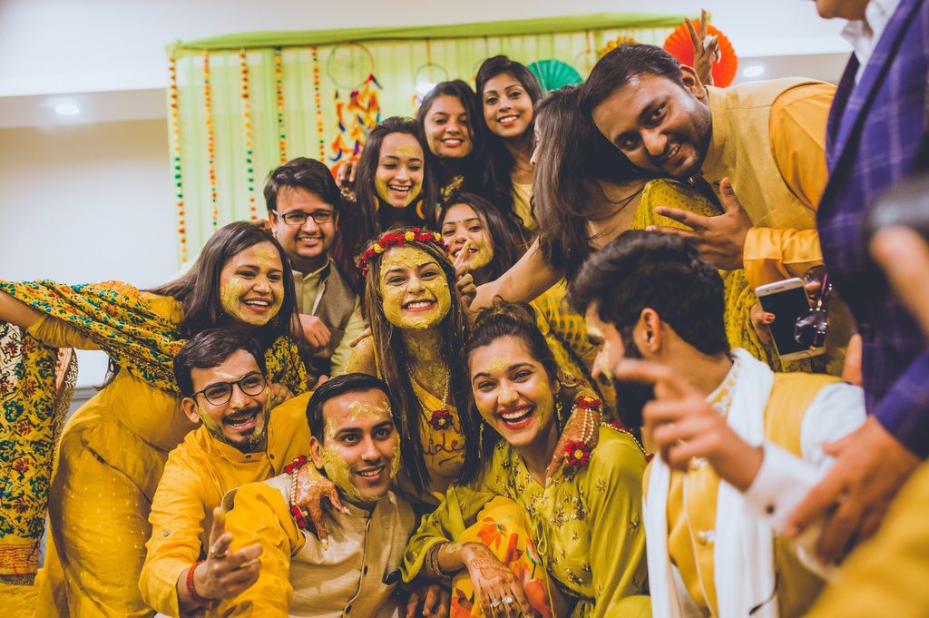 A Fun Delhi Wedding With A Colourful Mehendi | WedMeGood