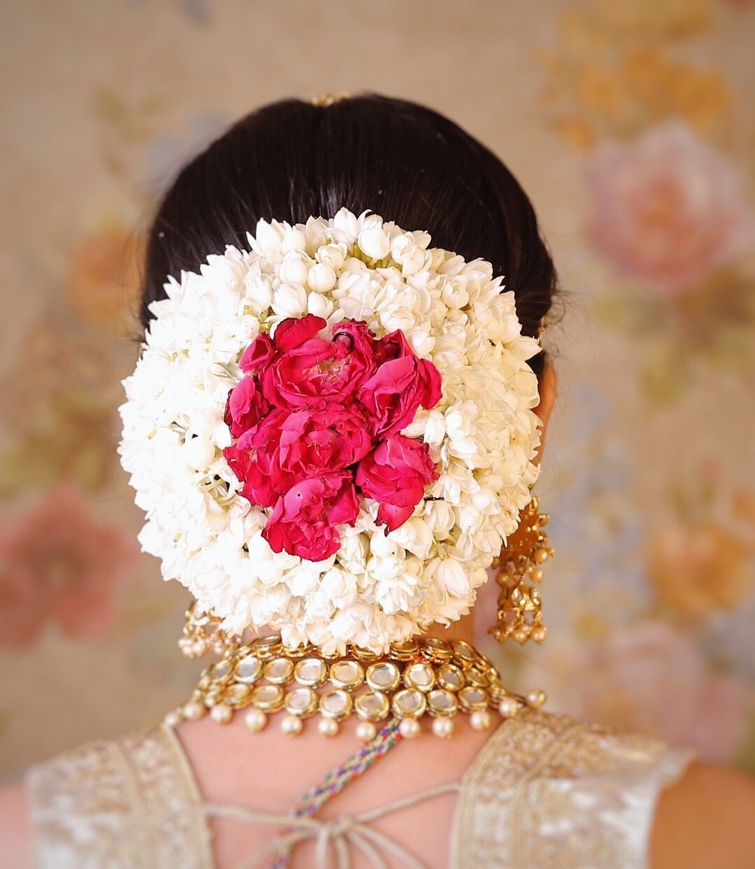 Bridal Bun Hairstyle with Gajra and roses