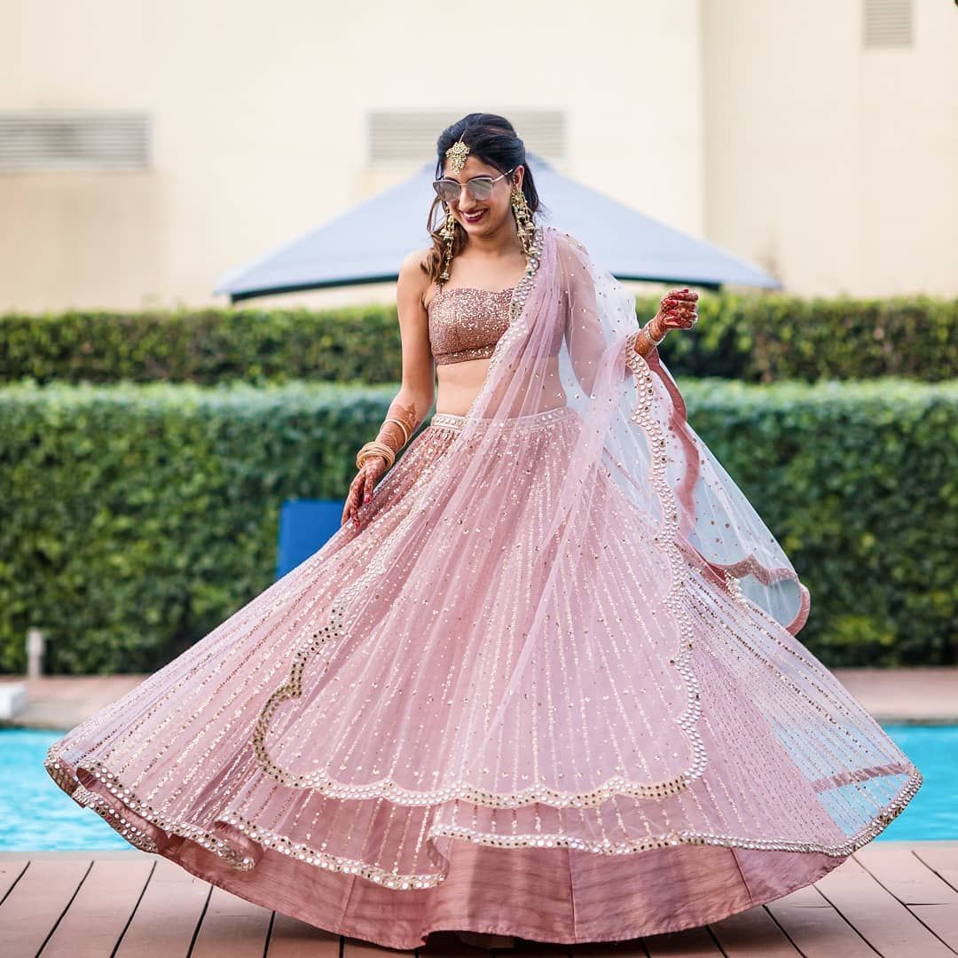 30 Glimmering Mirror Work Lehengas that will Satisfy your Blingy