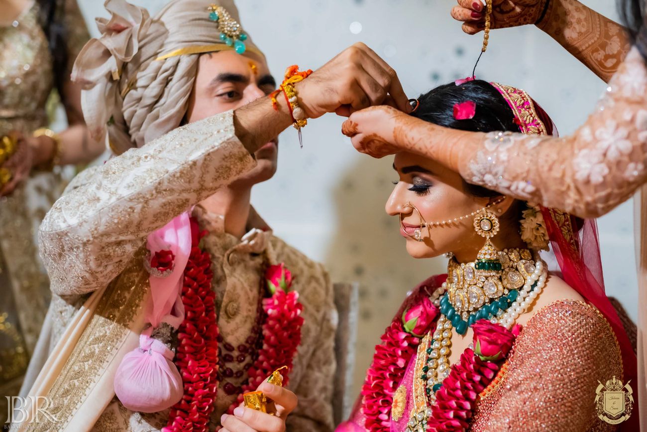 A Stunning Delhi Wedding With Customised Bridal Outfits Wedmegood 