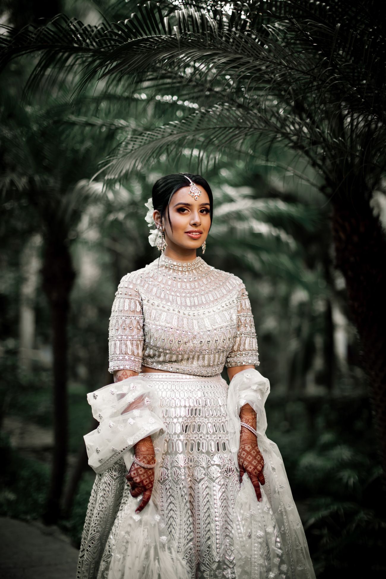 A Whimsical Engagement With A Bride In A Sparkly Silver Lehenga | WedMeGood