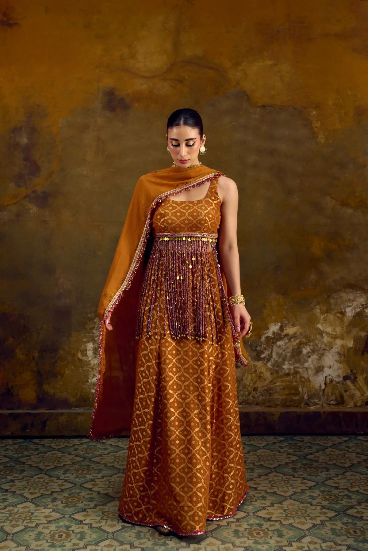 Mustard Banarasi lehenga with multicolour tassels