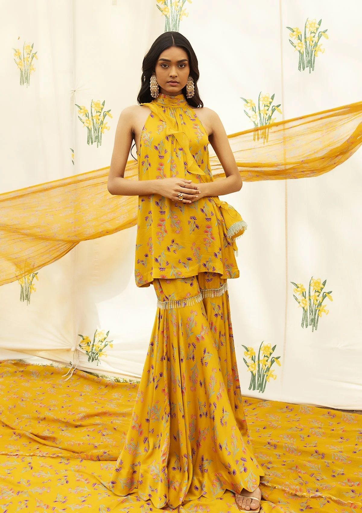 Amber halter top with sharara set for modern festive dressing