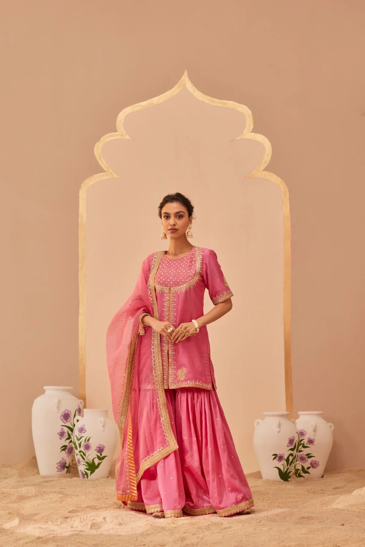 Flamingo pink kurta and garara set for festive occasions