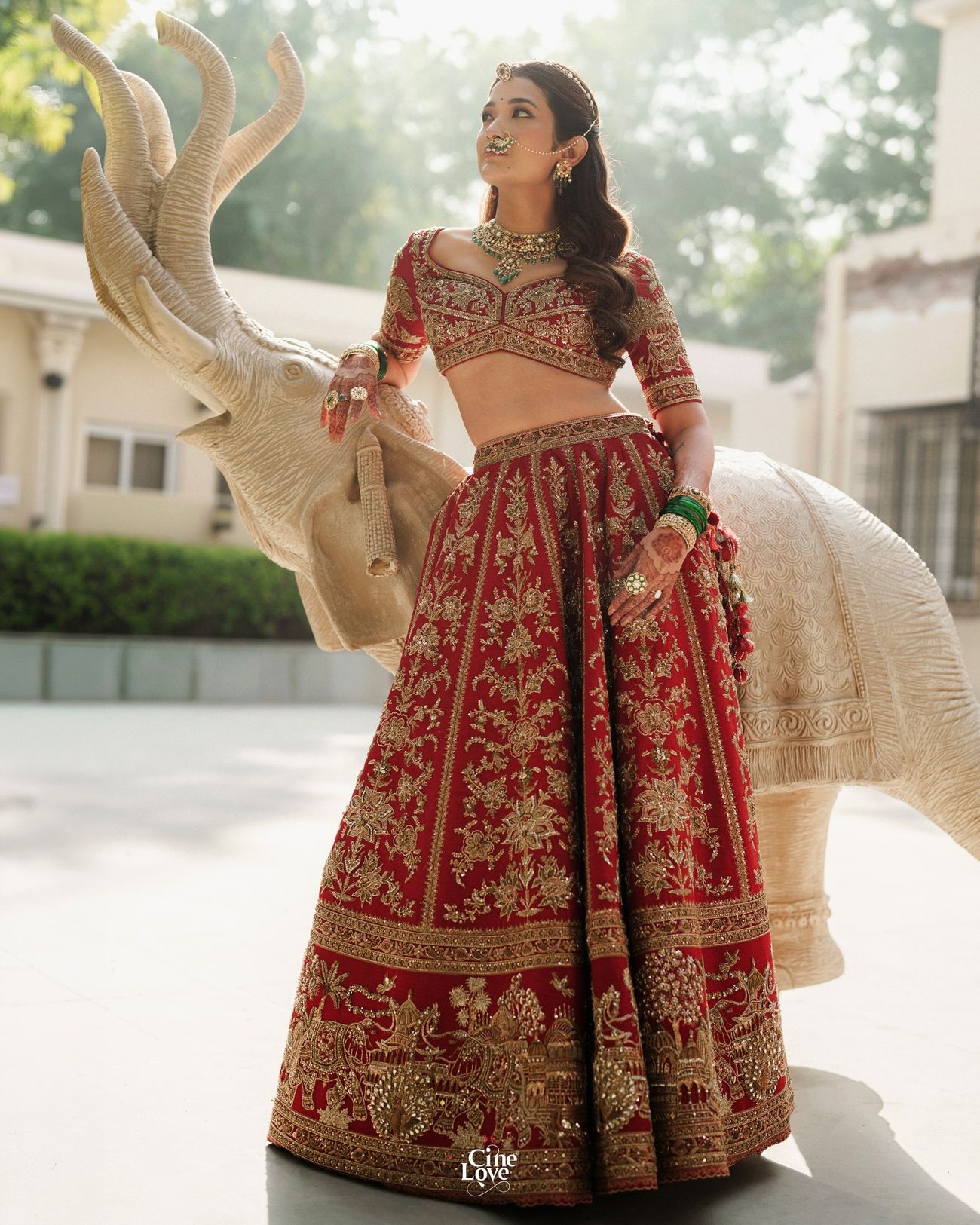 Bride in a stunning Torani bridal lehenga with intricate embroidery and traditional jewellery