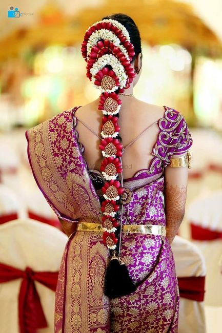 12 Pretty Floral Jadas We Spotted on South Indian Brides!