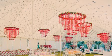 Floral Chandelier Decor Seems To Be A Hit This Wedding Season!