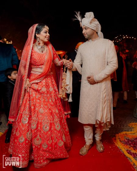 A Stunning Palace Wedding With The Bride In A Unique Orange Lehenga