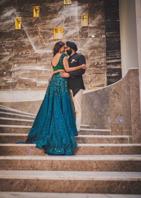 An Intimate Engagement With The Bride-To-Be In An Emerald Green Lehenga!