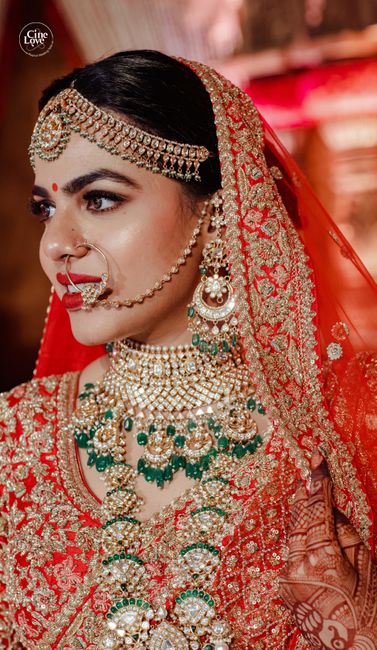 A Royal Wedding With A Dreamy Proposal & Traditional Red Lehenga