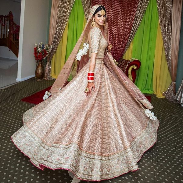 Light pink 2024 color bridal lehenga