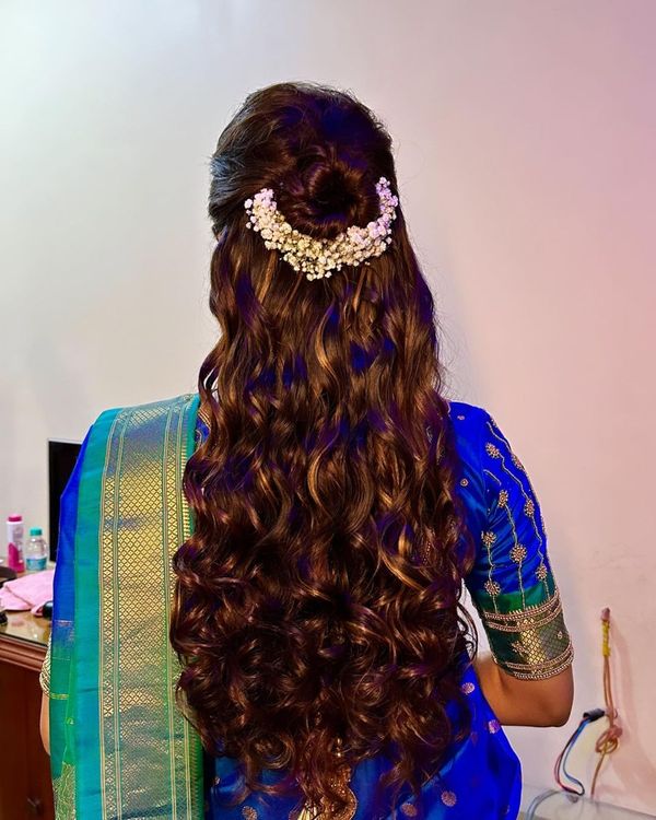 Vaishakhi's Orchid | In every fold of her nauvari saree and every glimmer  of her nath, lies the story of a majestic Maharashtrian bride.❣️💙❣️✨ M...  | Instagram