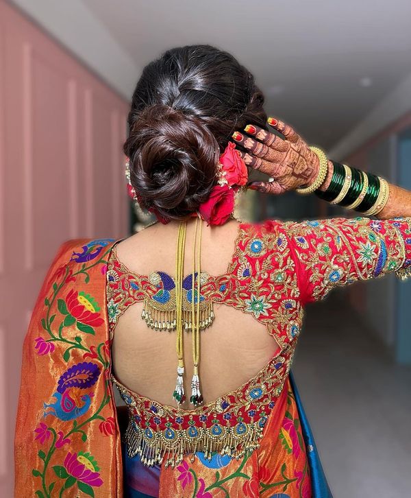 Meenal Unawane | The nauvari saree, khopa hairstyle, and real flower  accessories create such an elegant and traditional Maharashtrian bridal  look. My brid... | Instagram