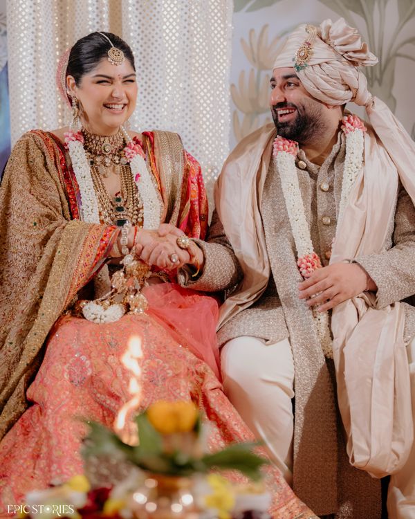 Anshula Kapoor wedding inspiration with a coral bridal lehenga