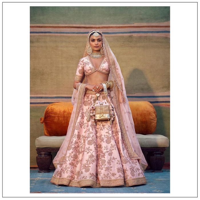 Isha Ambani's red velvet lehenga by Sabyasachi is the epitome of wedding  reception style goals. See pics | Fashion Trends - Hindustan Times