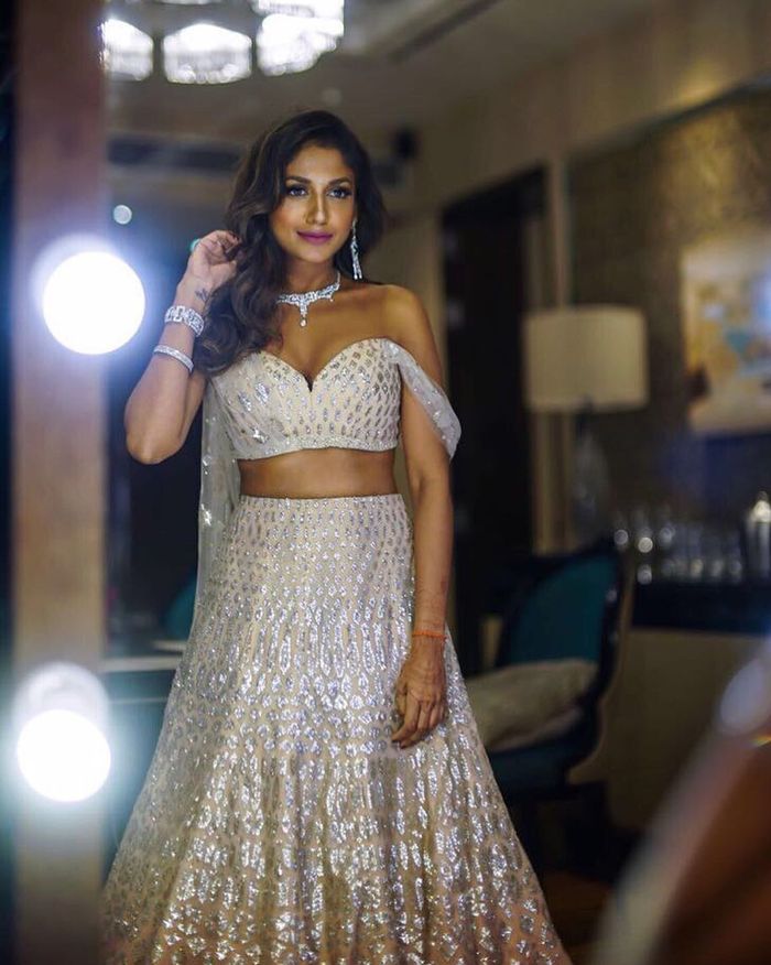 Tarun Tahiliani - Prerna Goel looks ethereal in the Pichwai lehenga from  our collection 'Eternal Dawn', which will be showcased at our Hyderabad  store between 16th and 18th August. A bold style