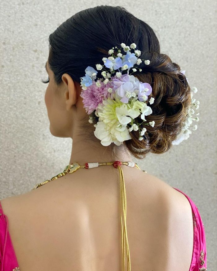 bun with floral accessories  Threads  WeRIndia