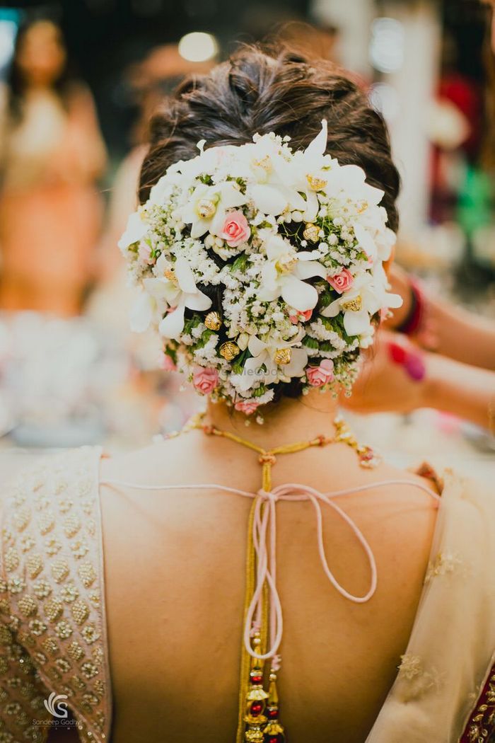 Add Vividness To Your Intimate Wedding With These Colorful Floral Buns |  WedMeGood