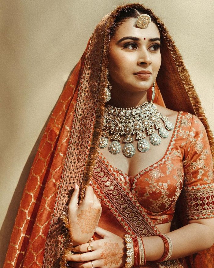 Sabyasachi hotsell orange lehenga