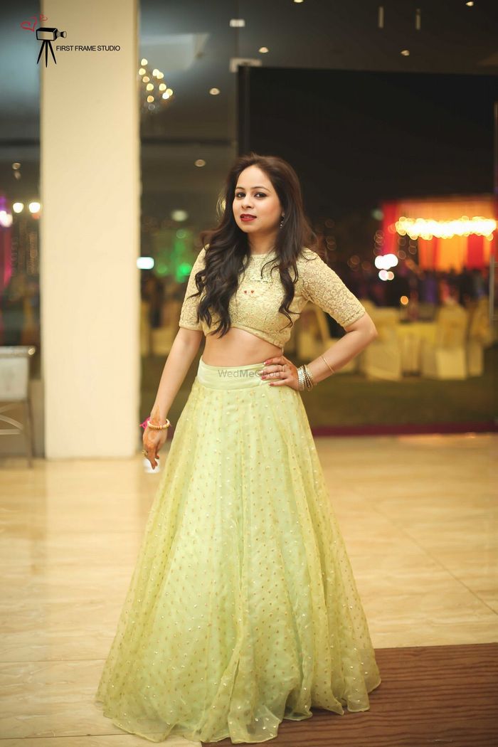 Radhika Merchant embodies cocktail glamour in an Abu Jani Sandeep Khosla  lehenga and gold makeup for her engagement to Anant Ambani | Vogue India