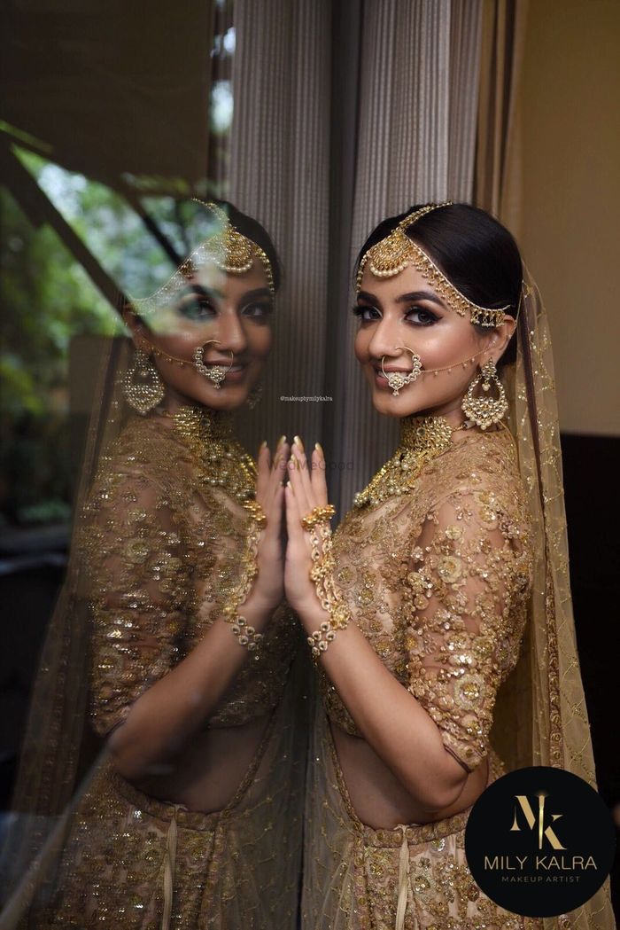 Golden lehenga with contrast green head dupatta n jewellery…………. Looks  awesome when brides mother itself designed @niyushii weddi... | Instagram