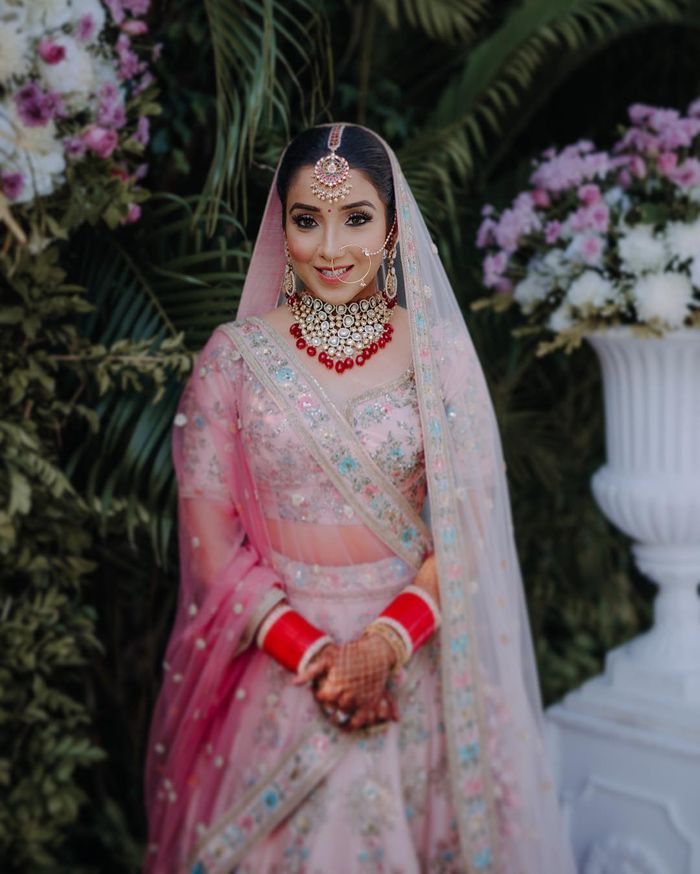 Photo of Bride in Pale Blue and Light Pink Bridal Lehenga