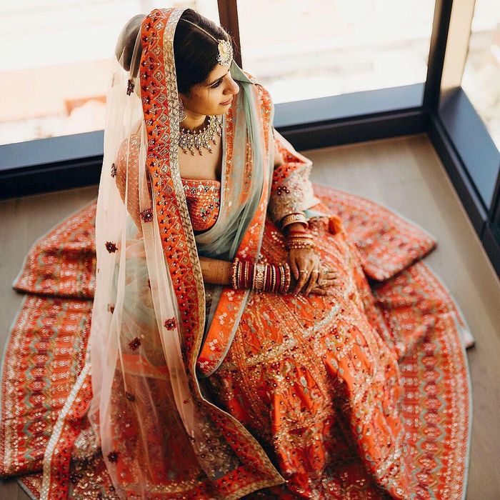 This bridal piece by #fascino🌺🌻🌼🌷 A beautiful orange with hot pink  combination lehenga for ur big day ! Wats app or inbox to ... | Instagram