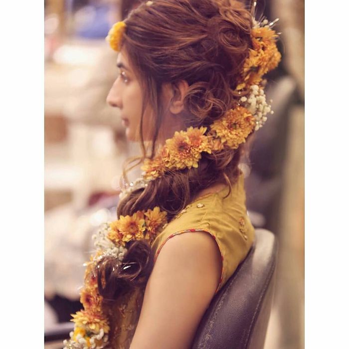 Elaborate yet pretty, this fishtail braid is adding that perfect touch of  elegance to the bride's Mehndi look. #bridalhairstyle #bridalm... |  Instagram