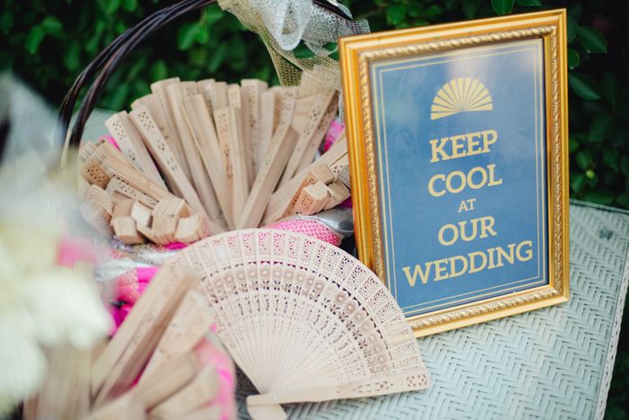 Provided wedding fans for guests to stay cool during the ceremony