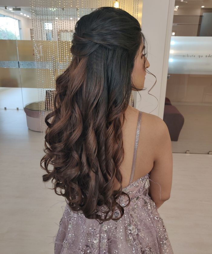 Image of Half up, half down hairstyle for long hair Indian