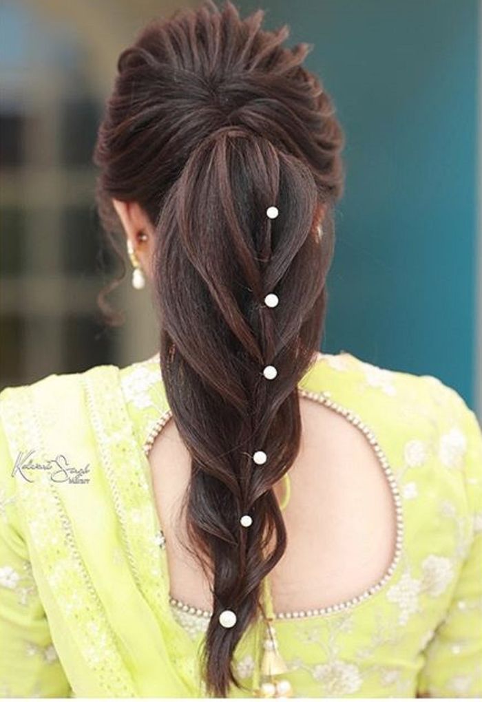 modern-low-ponytail-indian-reception-bridal-hairstyle | WedAbout