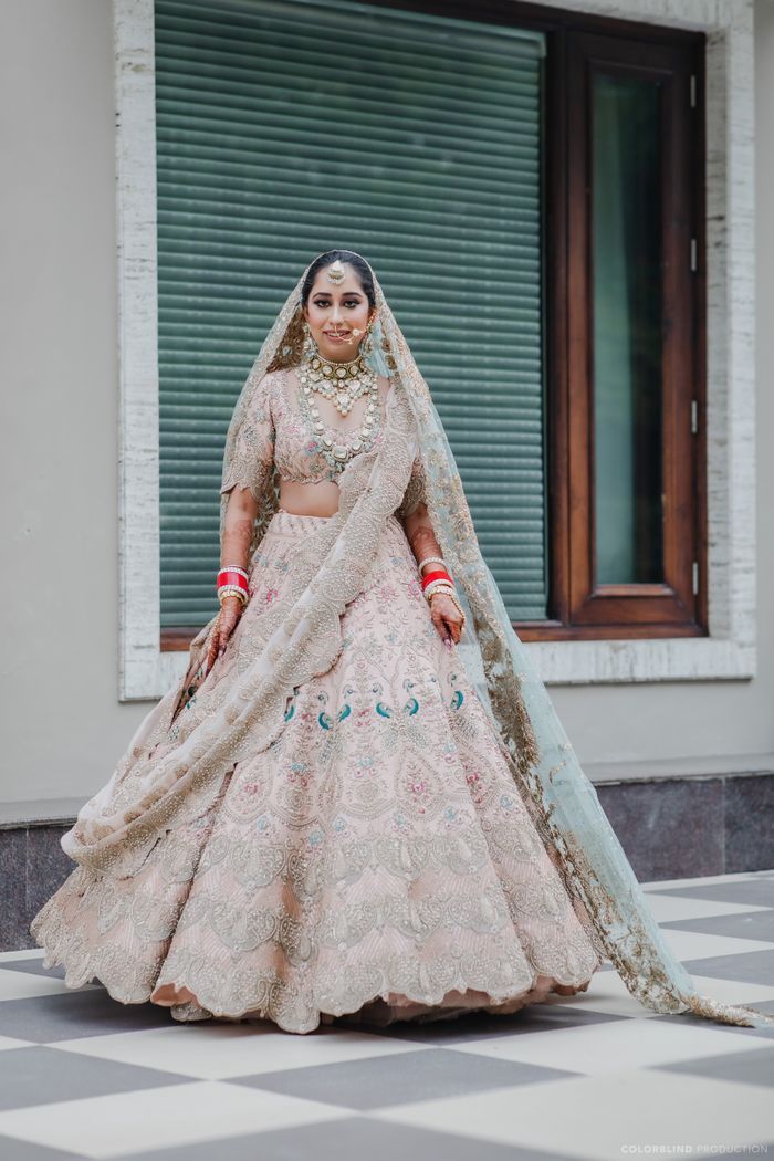 35 Punjabi Bridal Lehenga Styles that You Would Want to Steal! -  LooksGud.com | Indian bridal wear, Pink bridal lehenga, Indian bridal  lehenga