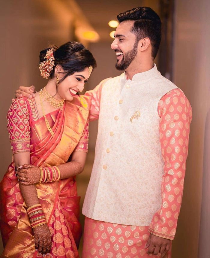 Kalyan Silks - Nithin P Ajay can't get over his lovely bride Sisira in her  stunning Rani pink Kanchipuram saree. We wish this adorable couple all the  very best for a wonderful