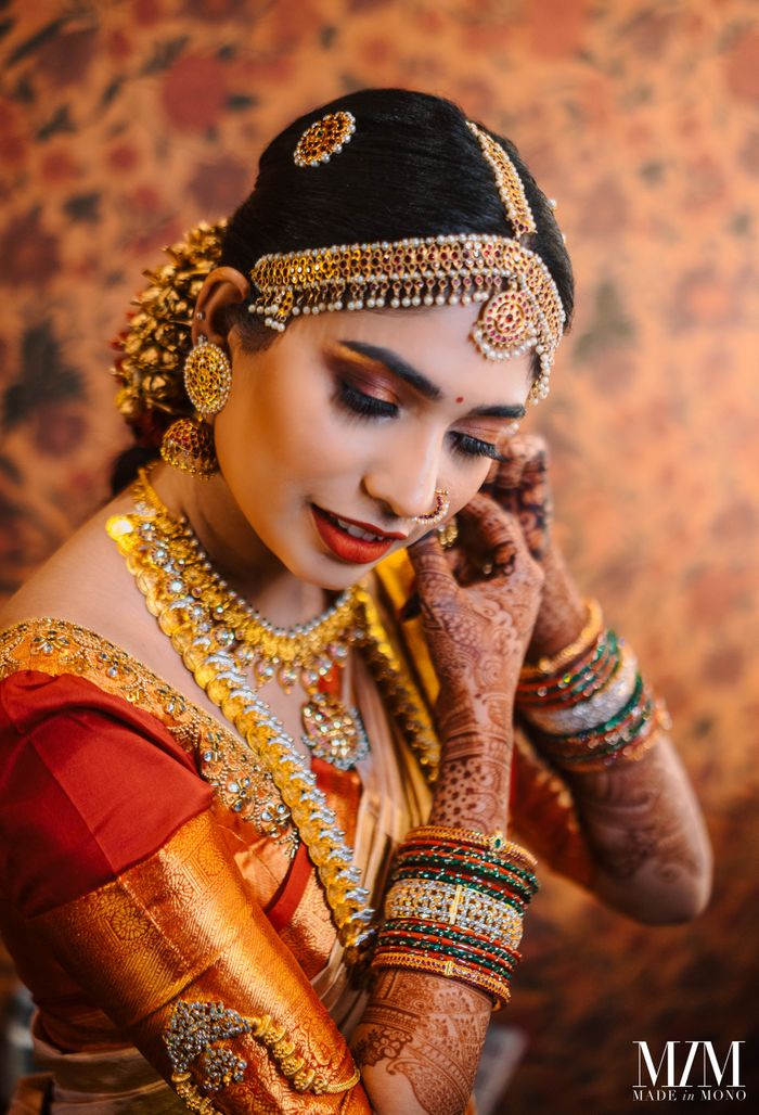 Saree - Bride with beautiful dark pink colour kanchi pattu saree with broad  jary leaf … | Indian wedding photography poses, Indian bridal photos, South  indian bride