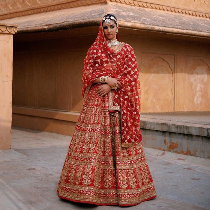 This Sabyasachi bride ditched the lehenga for a beautiful red sari - Times  of India