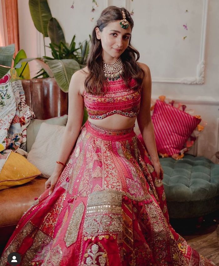 CELIA✨ An intricately handcrafted lehenga in our signature dusky pink  paired with a feather trimmed high neck blouse #AndLoveBlossoms #... |  Instagram