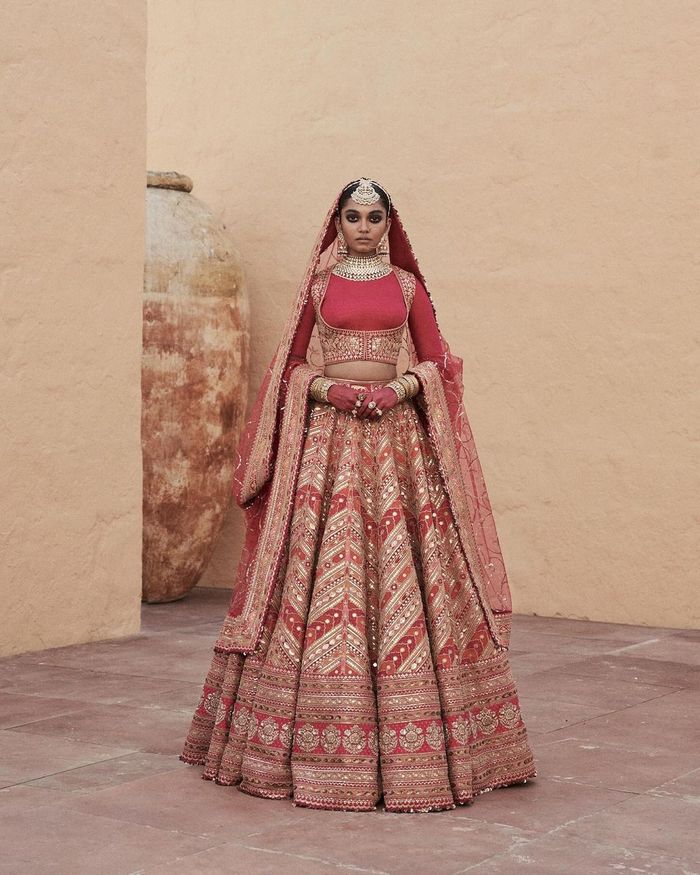 Classy Red colored Heavy Embroidered Bridal Lehenga Set - Rent