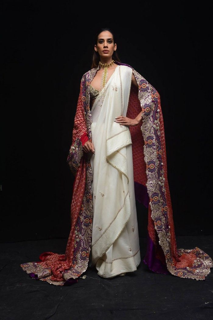 Saree with long jacket for winter weddings... | Instagram
