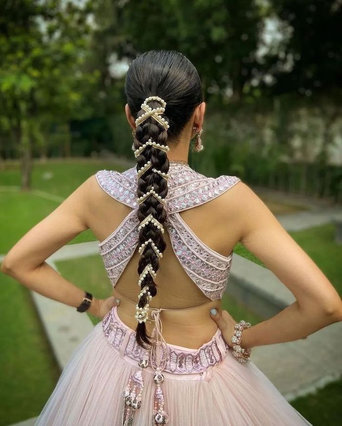 Sleek pearl braid for an Indo-Western reception outfit