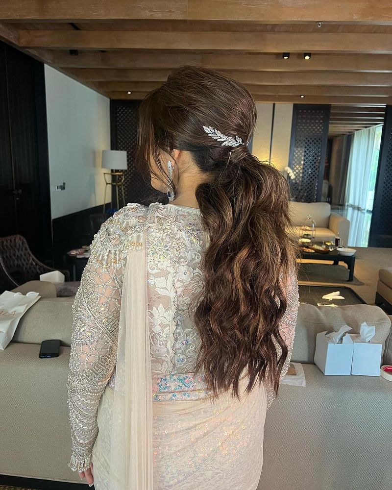 Messy textured ponytail for a reception