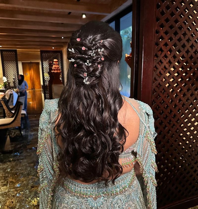 Romantic half braid half down reception hairstyle