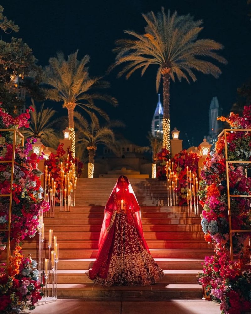 Bride appearing as a silhouette behind a backlit screen