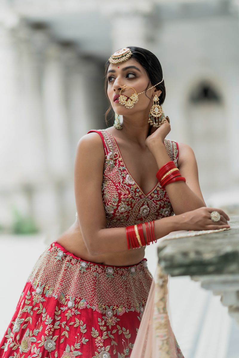 Delicate face jewellery worn along the hairline