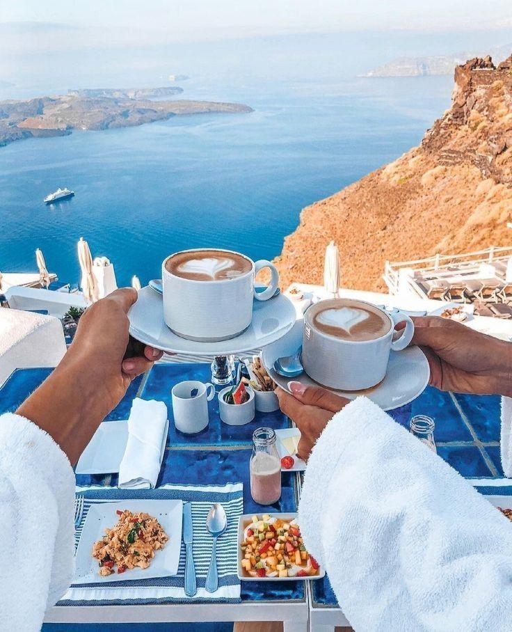 Whitewashed Greek island village above the sea